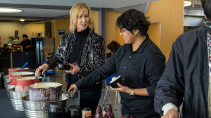 President Cathy Young and students enjoying ice cream at the Build-Your-Own Sundae Bar during the 2022 Inauguration Week. Photo by Liz Heath ’24.