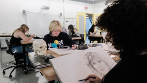 SADI 2025 student working on a figure drawing project.