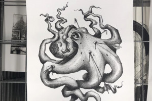 Photo of a black and white print of an octopus shot with arrows by Admissions Counselor Kylie Cropper