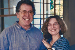 A photograph of Richard Posniak and his wife Mary Ann Krutsick standing next to each other and smiling for the camera. 