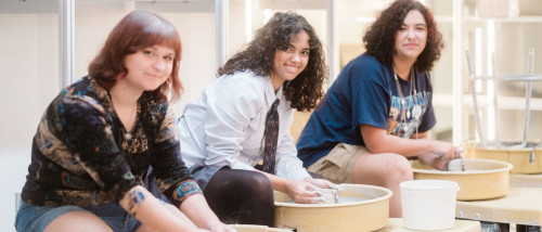 Students playing games in the newly renovated VAULT.