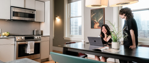 Students in a residence room in Stahl Hall.