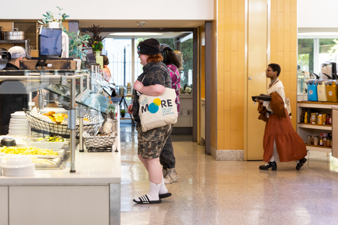 A student ordering food from the Dining Hall.