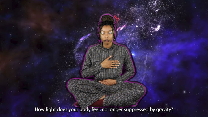 Thumbnail from Laila Islam's senior thesis video. Islam is sitting cross-legged on the floor in front of a purple galaxy background. Islam's hands are crossed on their chest and the text reads: "How light does your body feel, no longer suppressed by gravity?"